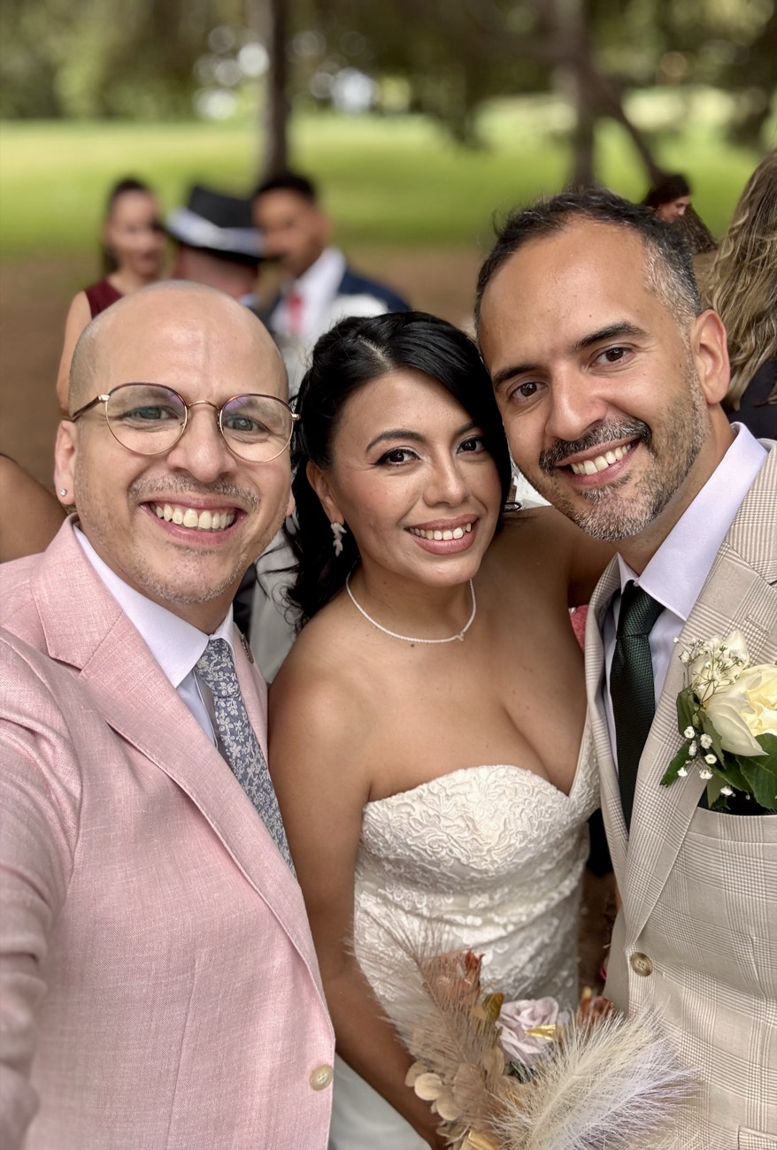Andrés celebrating with a couple at their bilingual Adelaide wedding