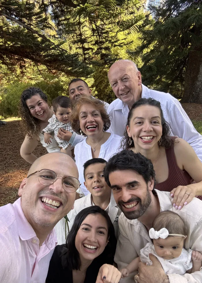 Andrés with a family celebrating together after their ceremony